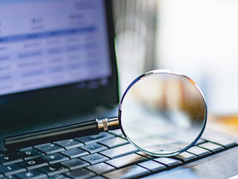 Magnifying glass on computer keyboard