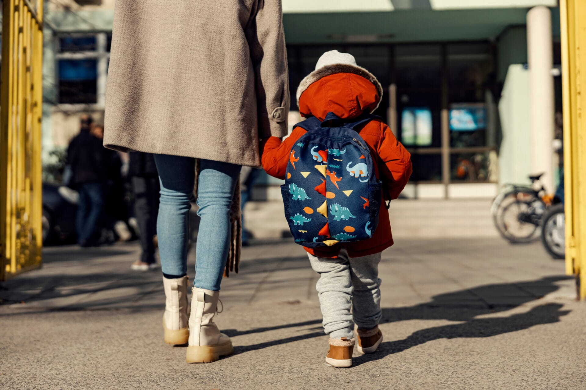 Parent taking child to daycare