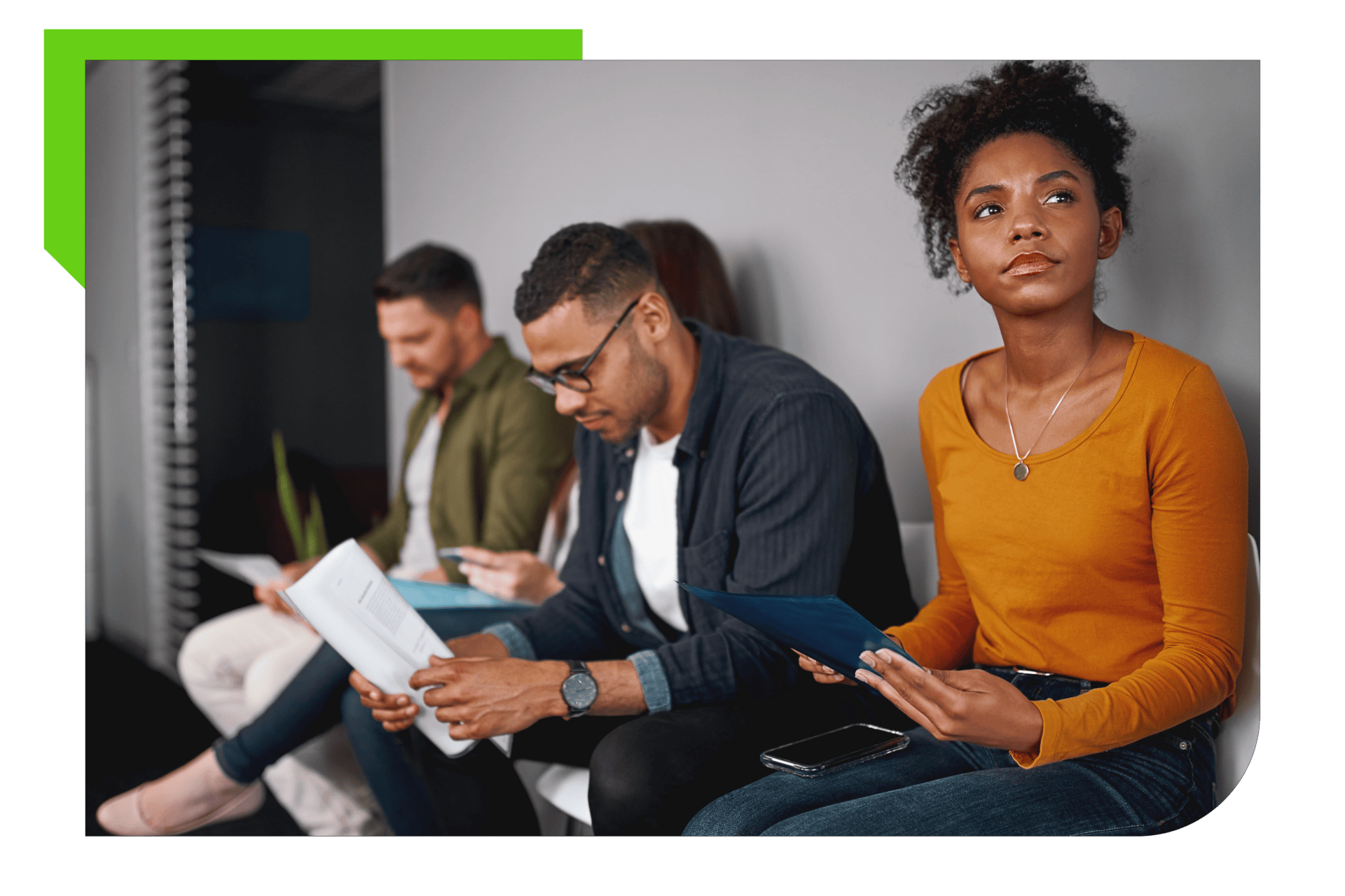 Job candidates sitting in waiting room