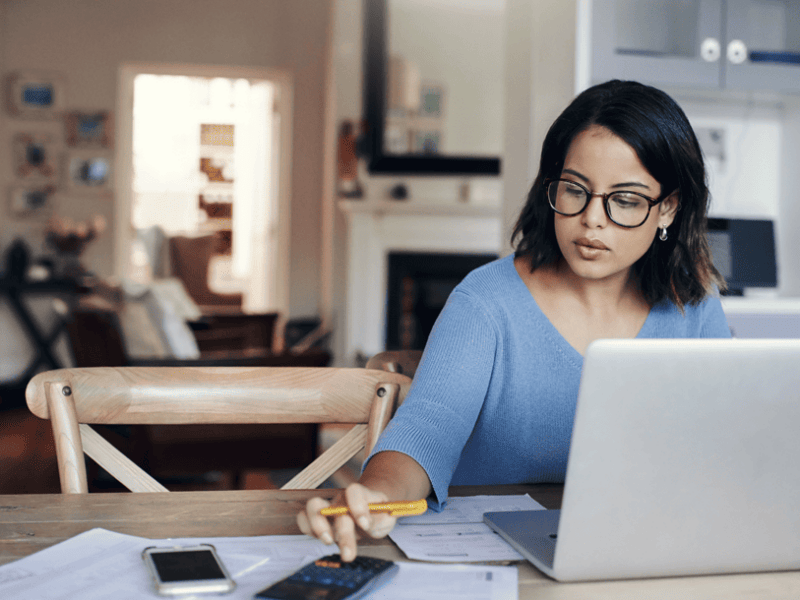 woman working on laptop at desk