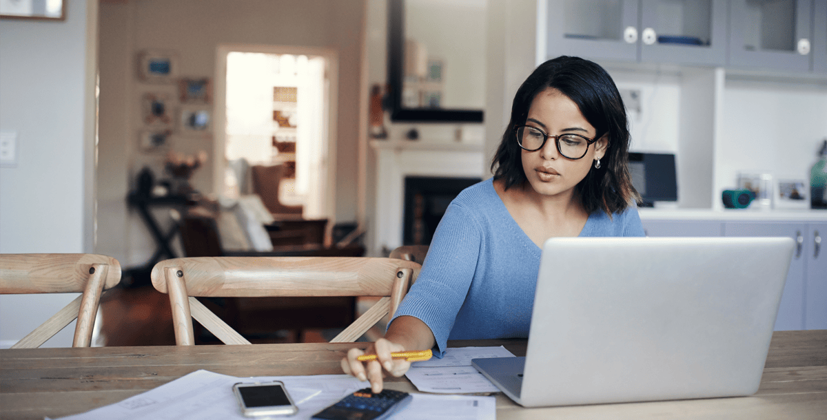 woman working on laptop at desk