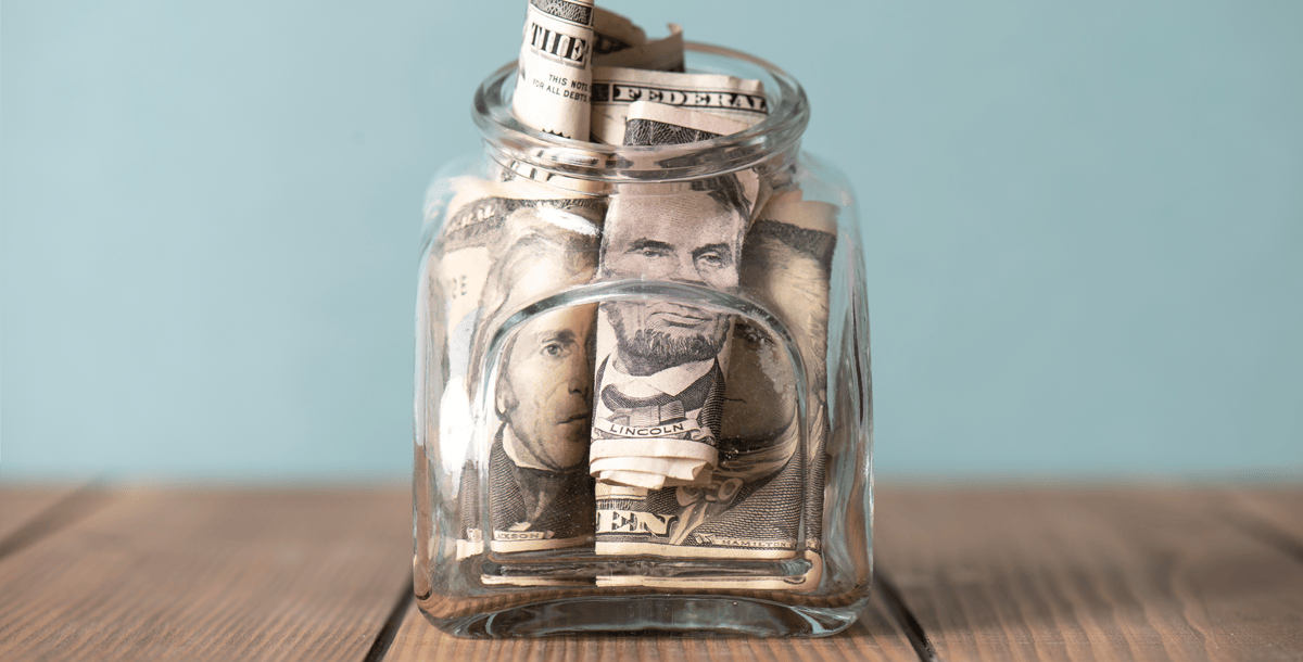 American money in clear glass jar