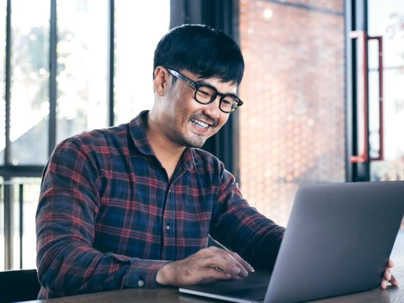 man on computer preboarding employees